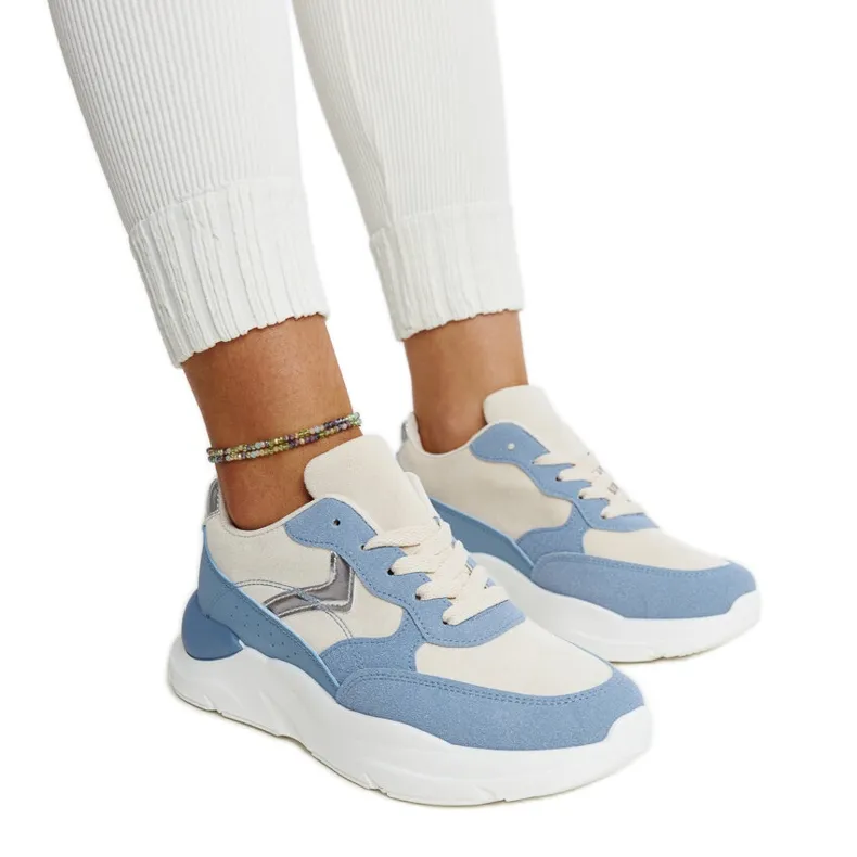 Beige and blue sneakers on the Nereida platform