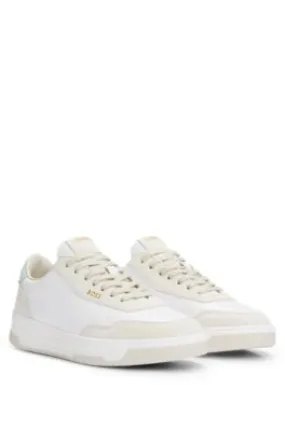 Branded lace-up trainers in leather and nubuck