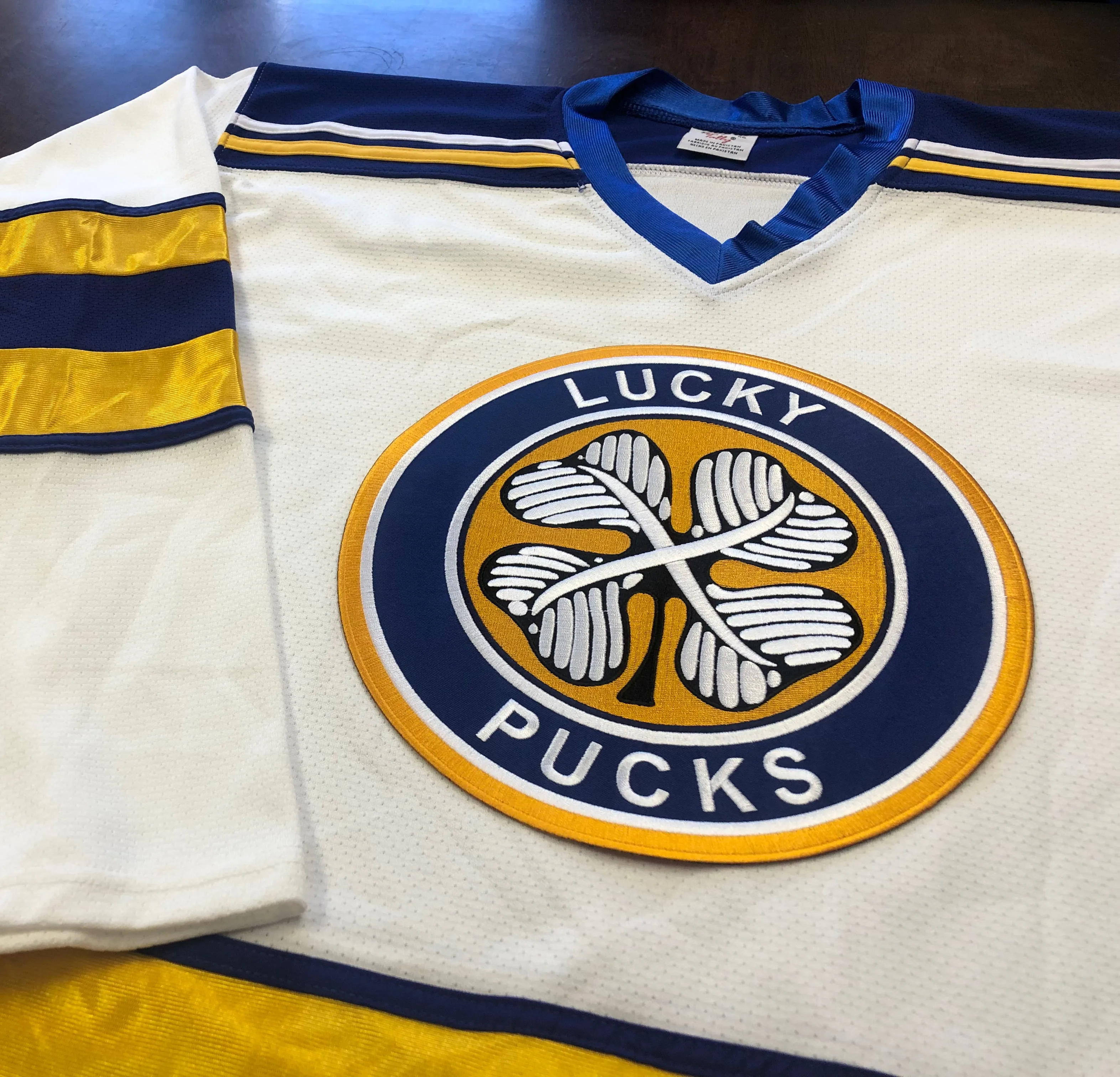 Custom Hockey Jerseys with a Lucky Pucks Embroidered Twill Logo