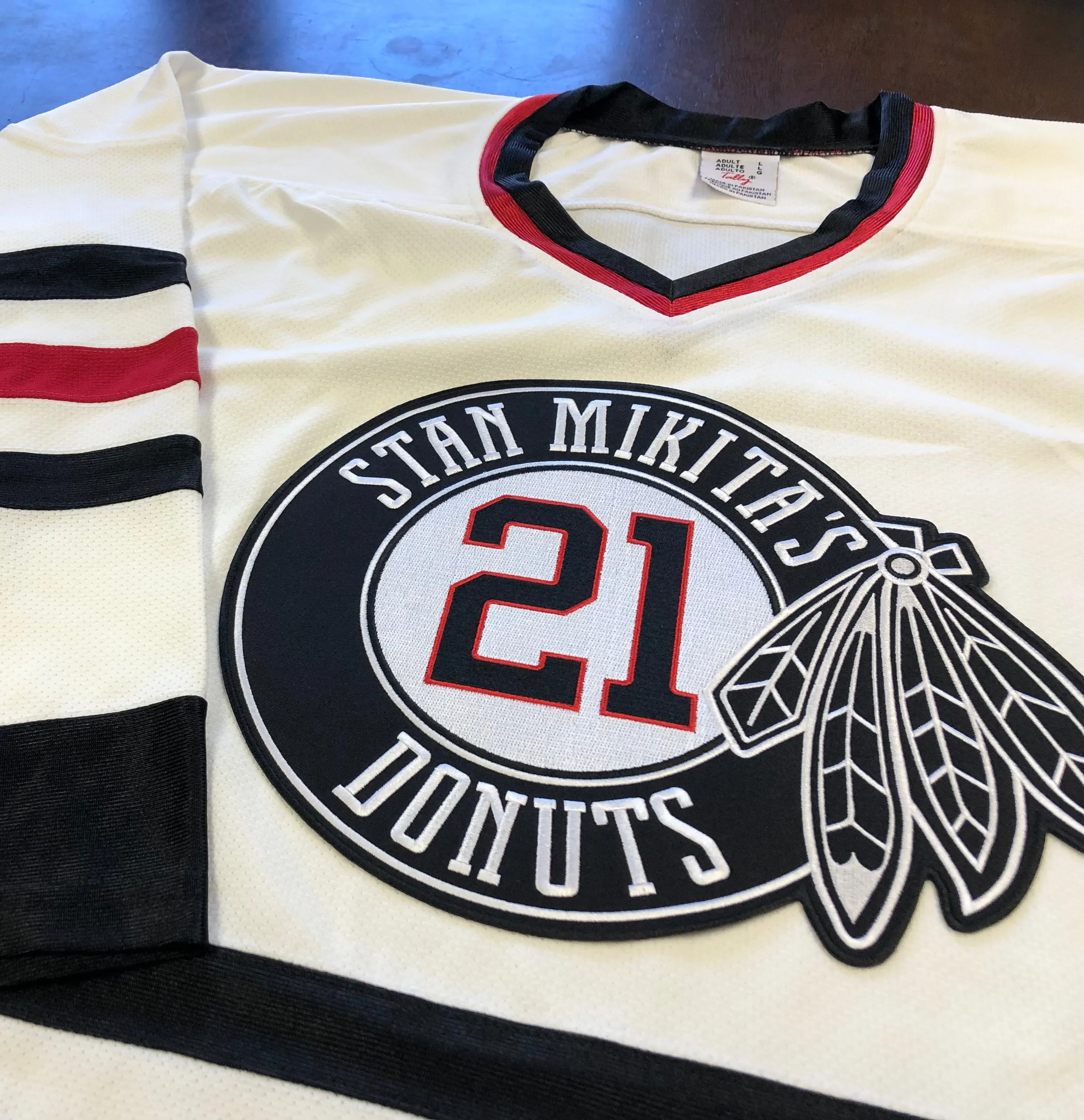 Custom Hockey Jerseys with a Mikita's Donuts Embroidered Twill Logo