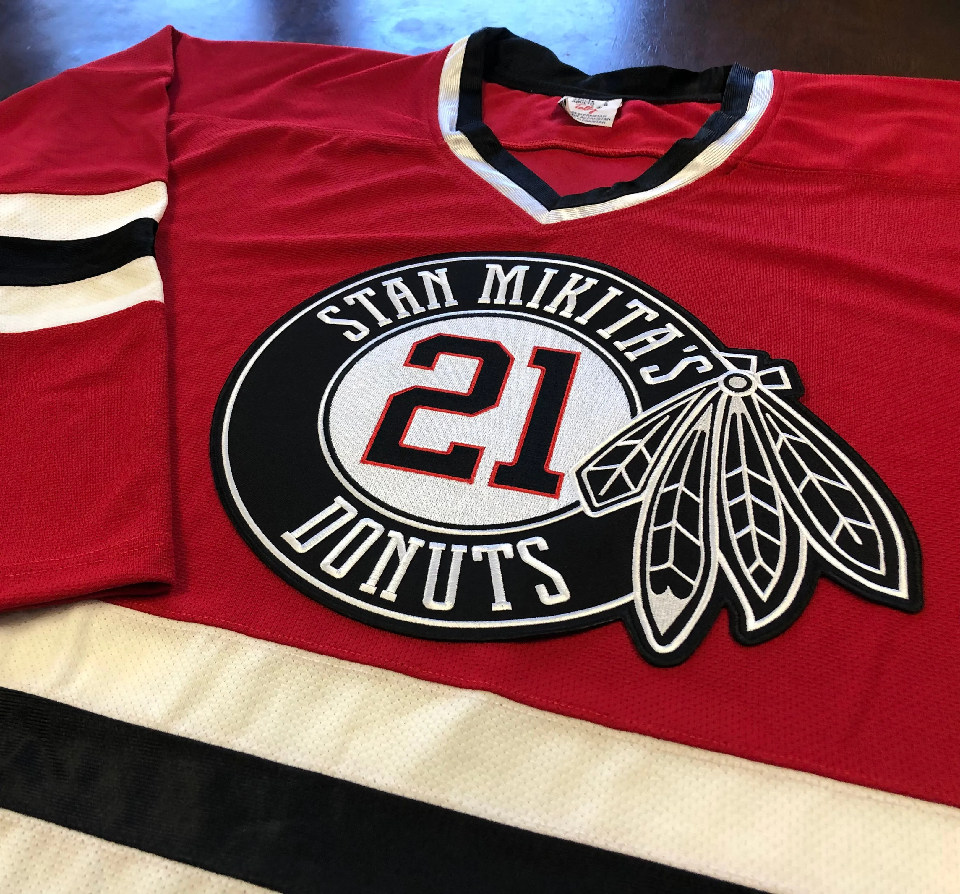 Custom Hockey Jerseys with a Mikita's Donuts Embroidered Twill Logo