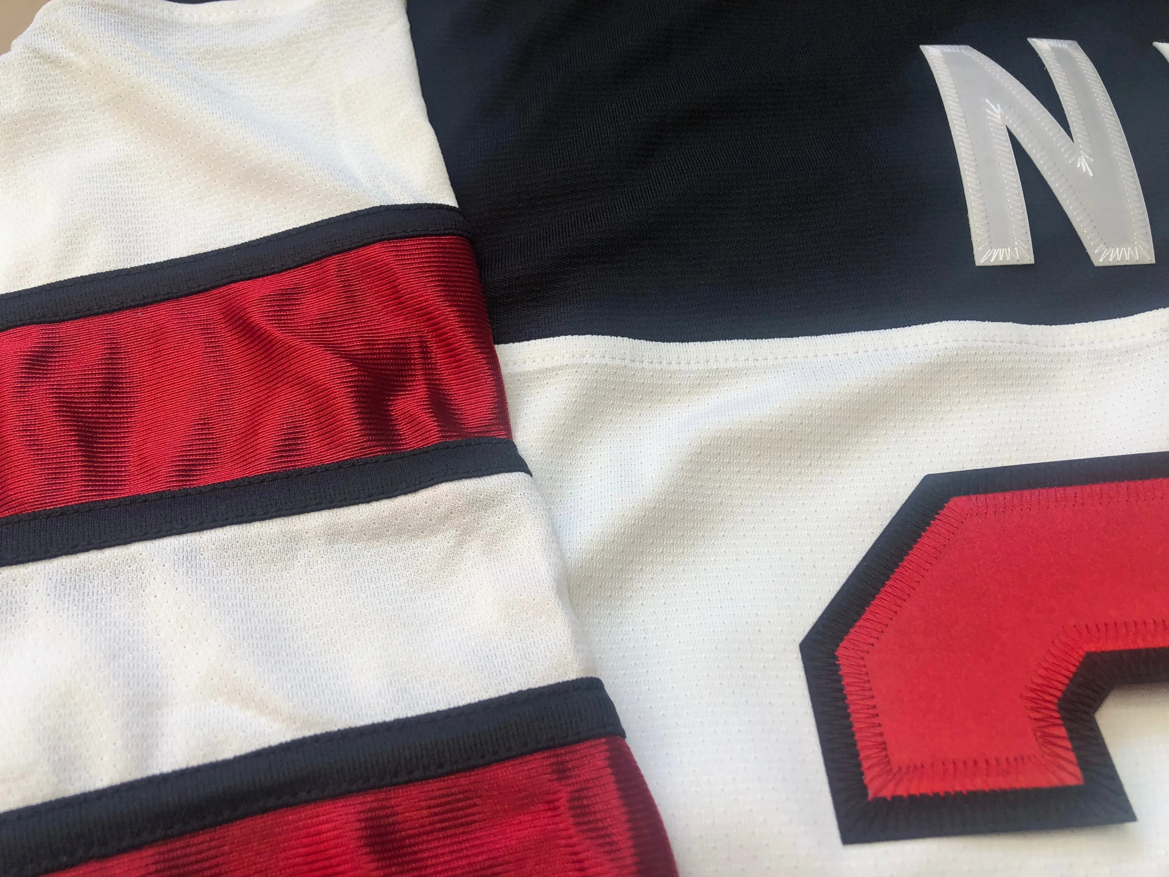 Custom Hockey Jerseys with a Skating Devil Embroidered Twill Logo