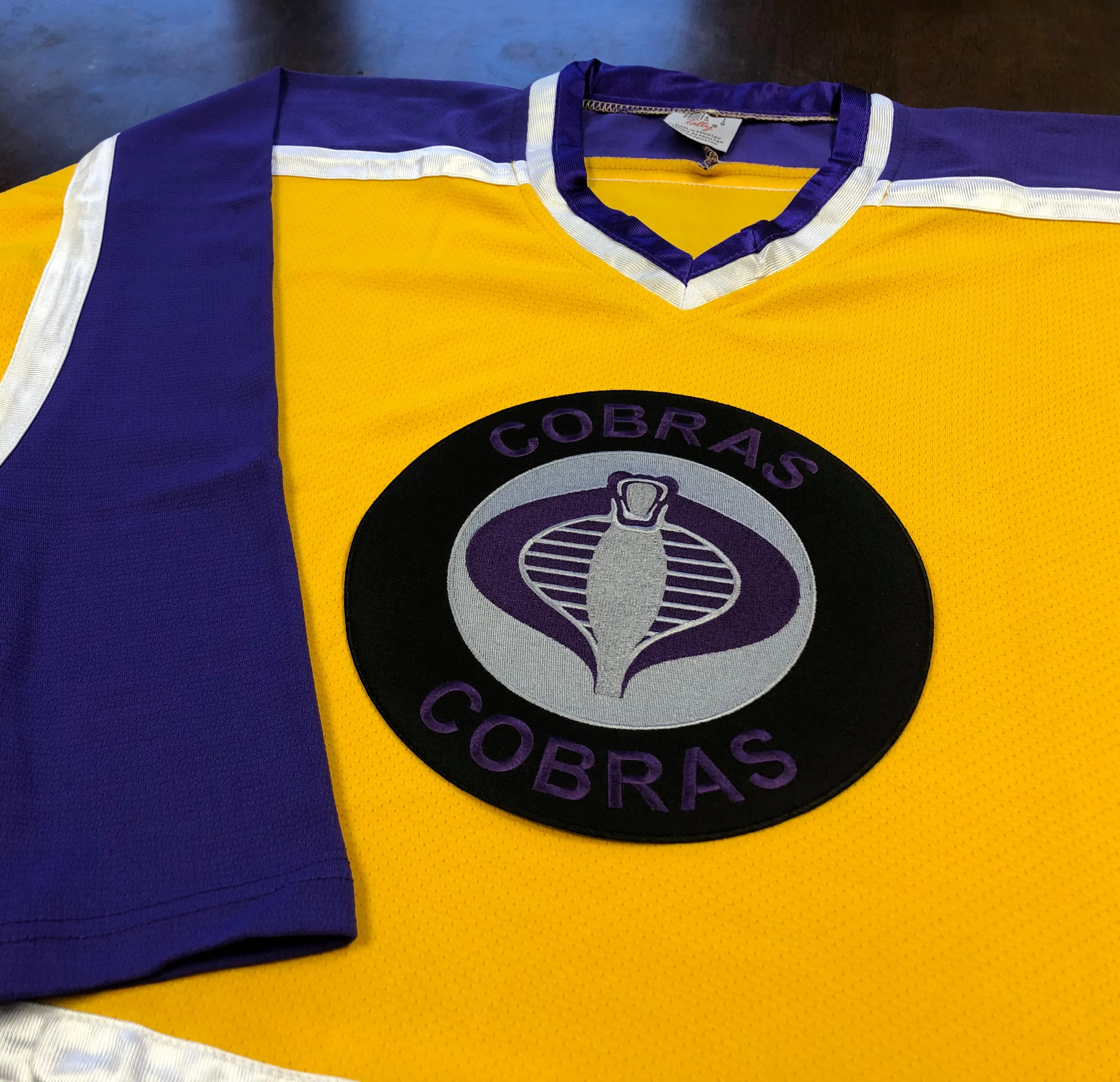 Custom Hockey Jerseys with the Cobras Embroidered Twill Logo