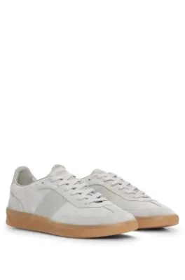 Low-top trainers in leather and suede