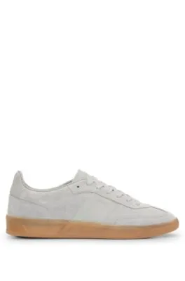 Low-top trainers in leather and suede