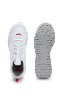 Mixed-material lace-up trainers with branded laces