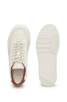 Mixed-material trainers with leather trims