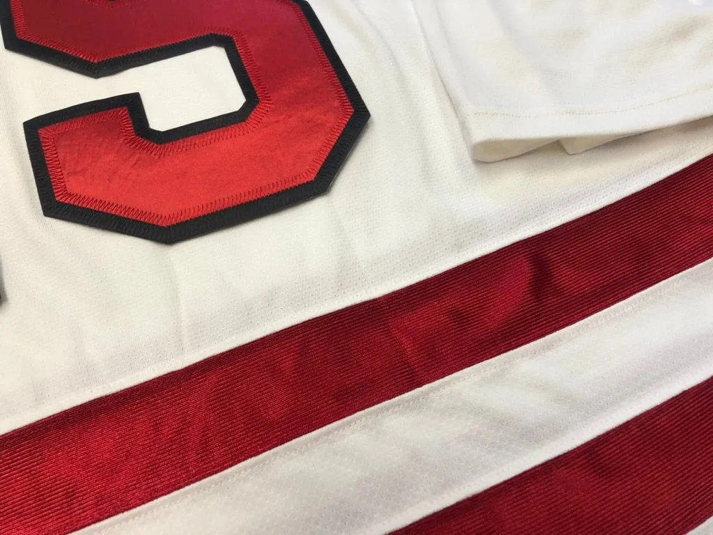 Red and White Hockey Jerseys with the Mustangs Twill Logo