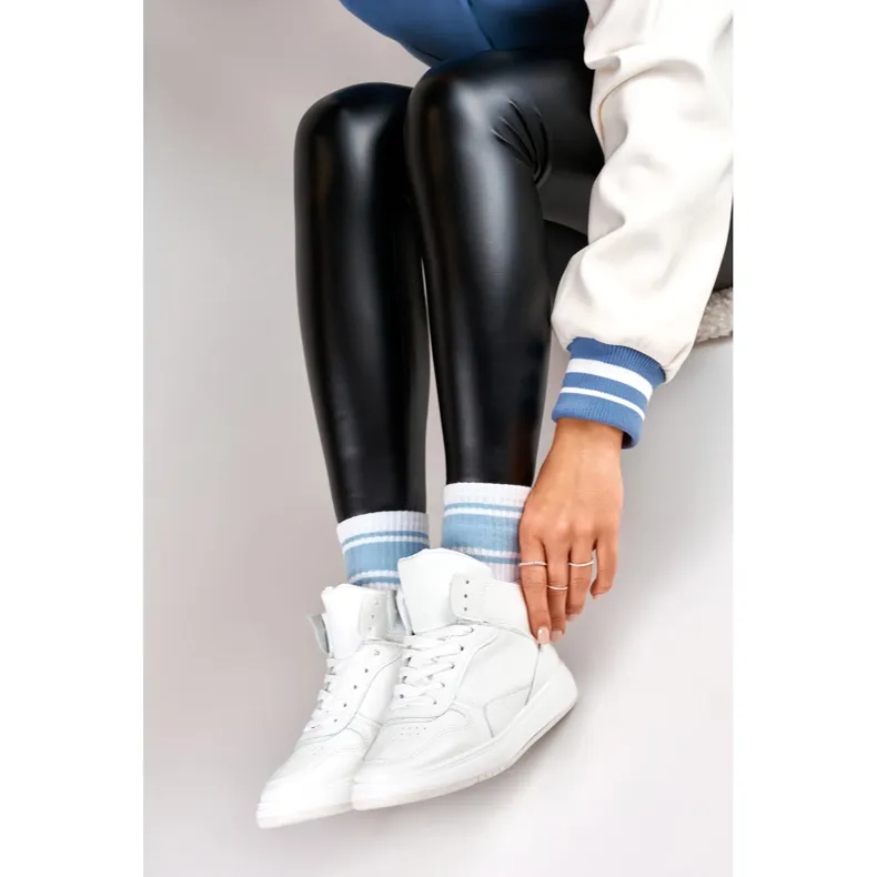 Women's white sneakers above the ankle