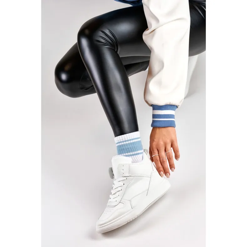 Women's white sneakers above the ankle