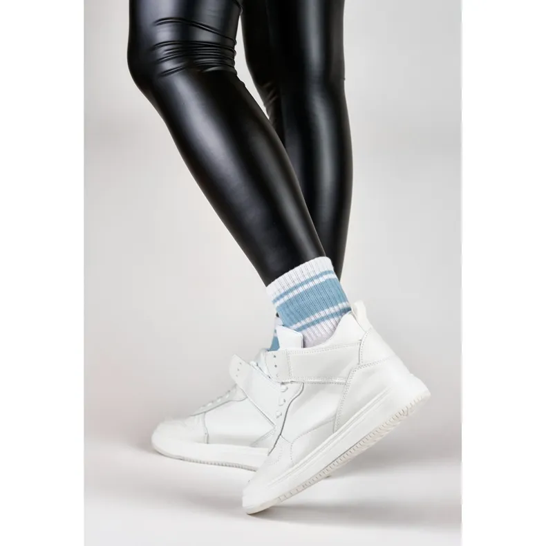 Women's white sneakers above the ankle