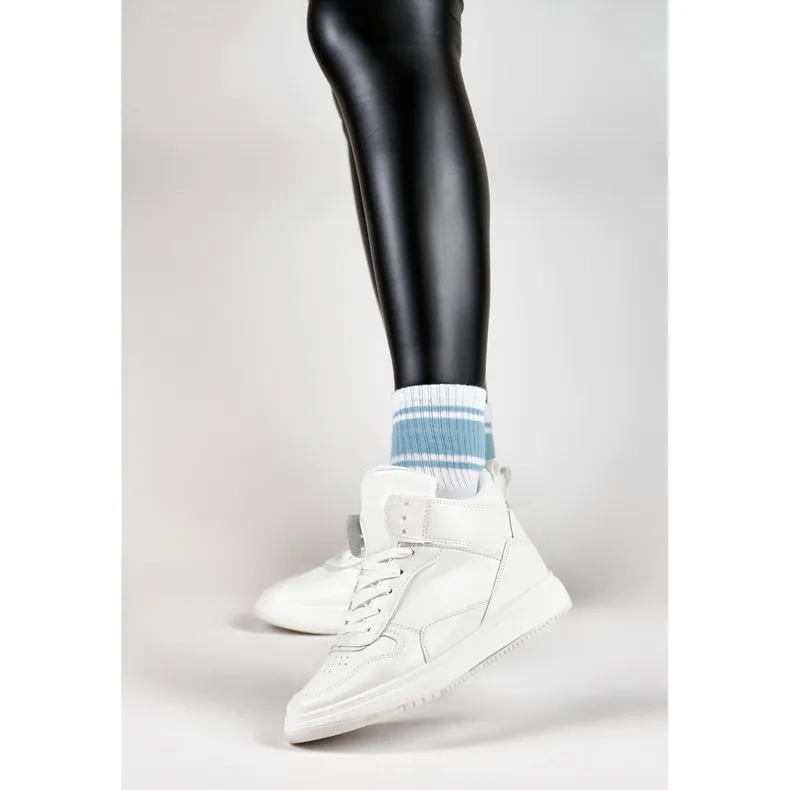 Women's white sneakers above the ankle